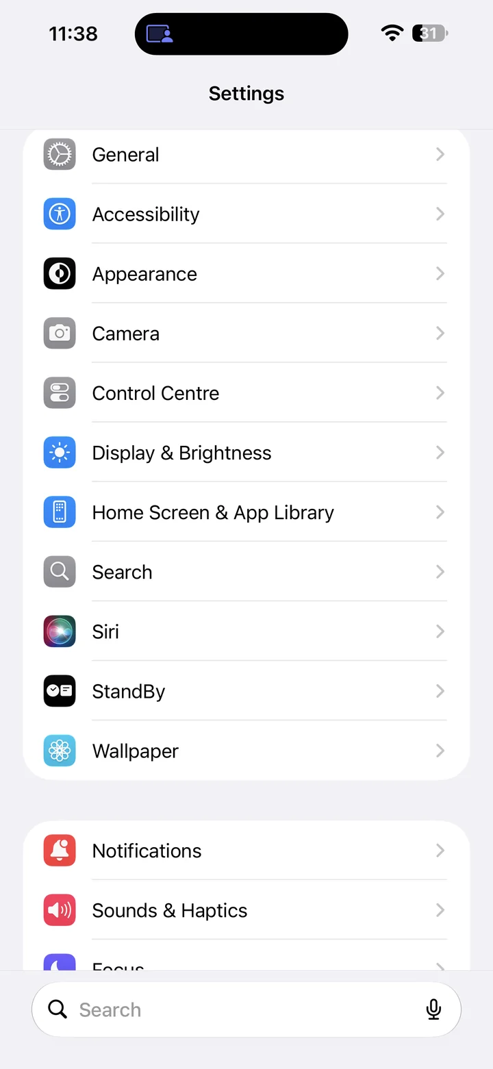 Settings screen showing Display & Brightness below Control Centre